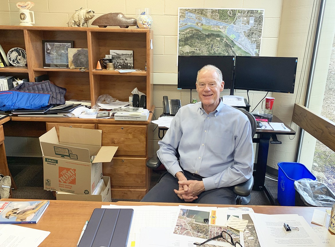Mike Gridley, sitting in his office at City Hall, is retiring after 20 years as attorney for the city of Coeur d'Alene.