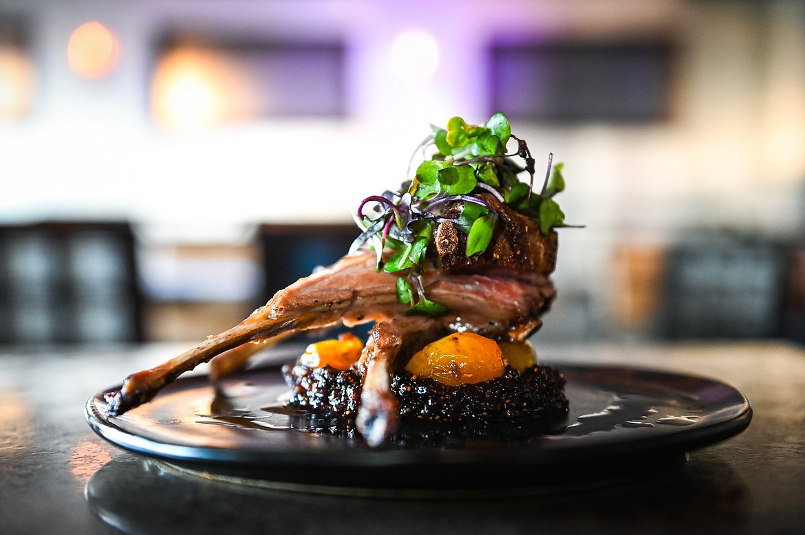 Lamb lollipops with balsamic fig jam and blistered heirloom grape tomatoes at Alchemy Lounge in Kalispell on Wednesday, March 9. (Casey Kreider/Daily Inter Lake)
