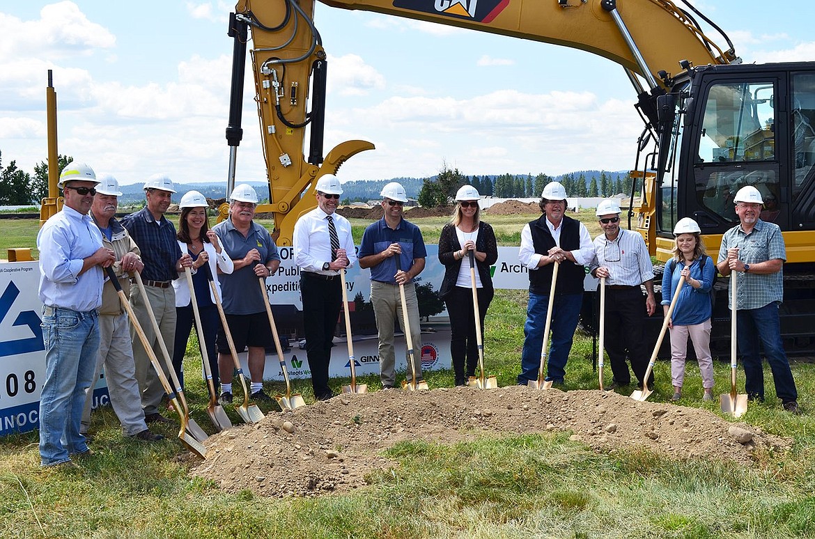 Bryan Martin, second from left, at the July 18, 2019, groundbreaking ceremony for Northwest Expedition Academy on Prairie Avenue. Also pictured, from left: Rich Wells, President, Ginno Construction Co.; Director of Maintenance Jeff Voeller; former Trustee Lisa May; former Trustee Tom Hearn; former Superintendent Steve Cook; Trustee Casey Morrisoe; former Trustee Tambra Pickford; Jon Mueller, Architects West; Scott Fischer, Architects West; Meghan Teichmann, Architects West; NExA Principal Bill Rutherford. Photo courtesy of the Coeur d'Alene School District