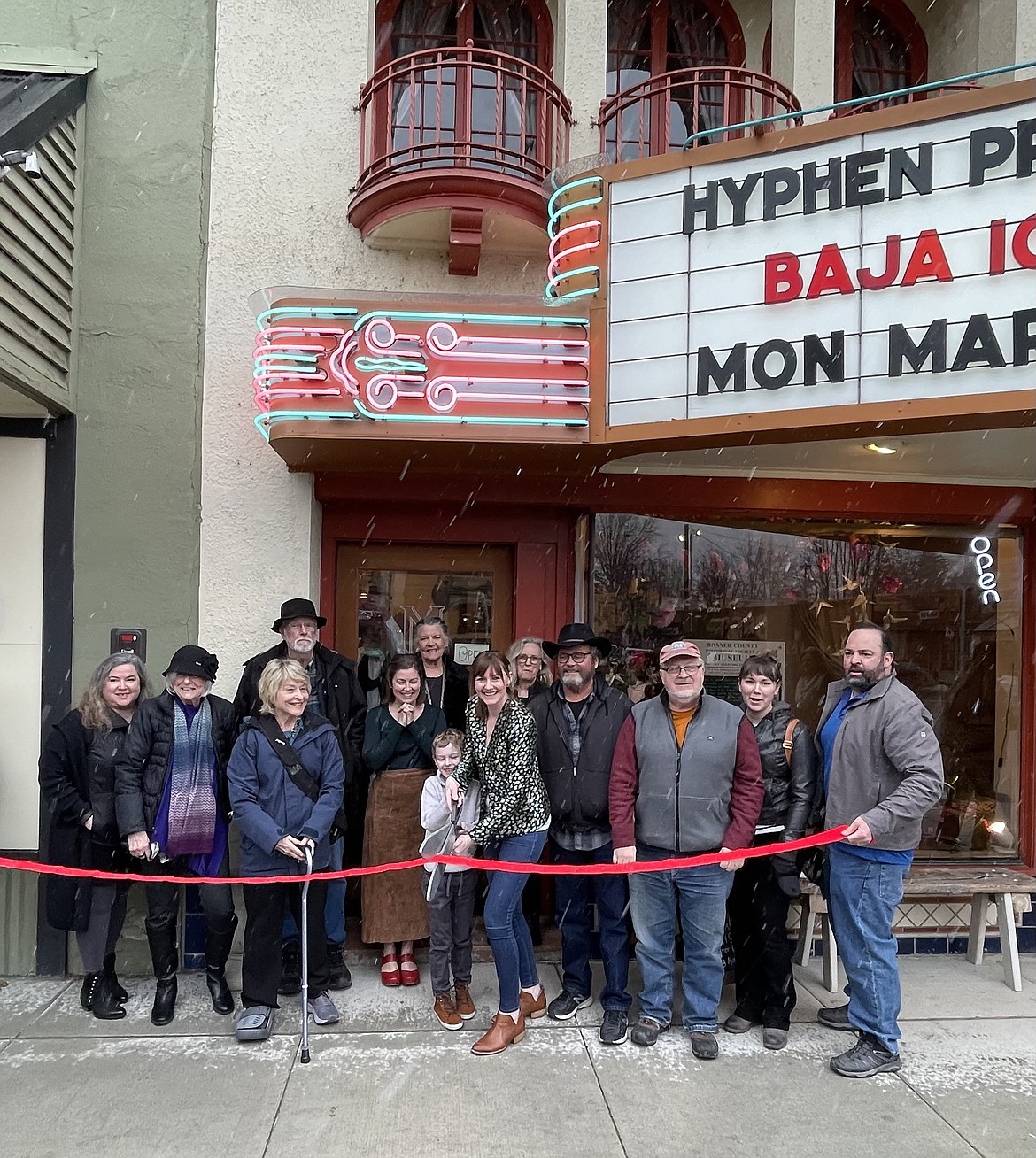 Museum officials, Museum Guild members and representatives from the Greater Sandpoint Chamber of Commerce take part in a ribbon-cutting of the new venture, located at 300 N. First Ave., Sandpoint.