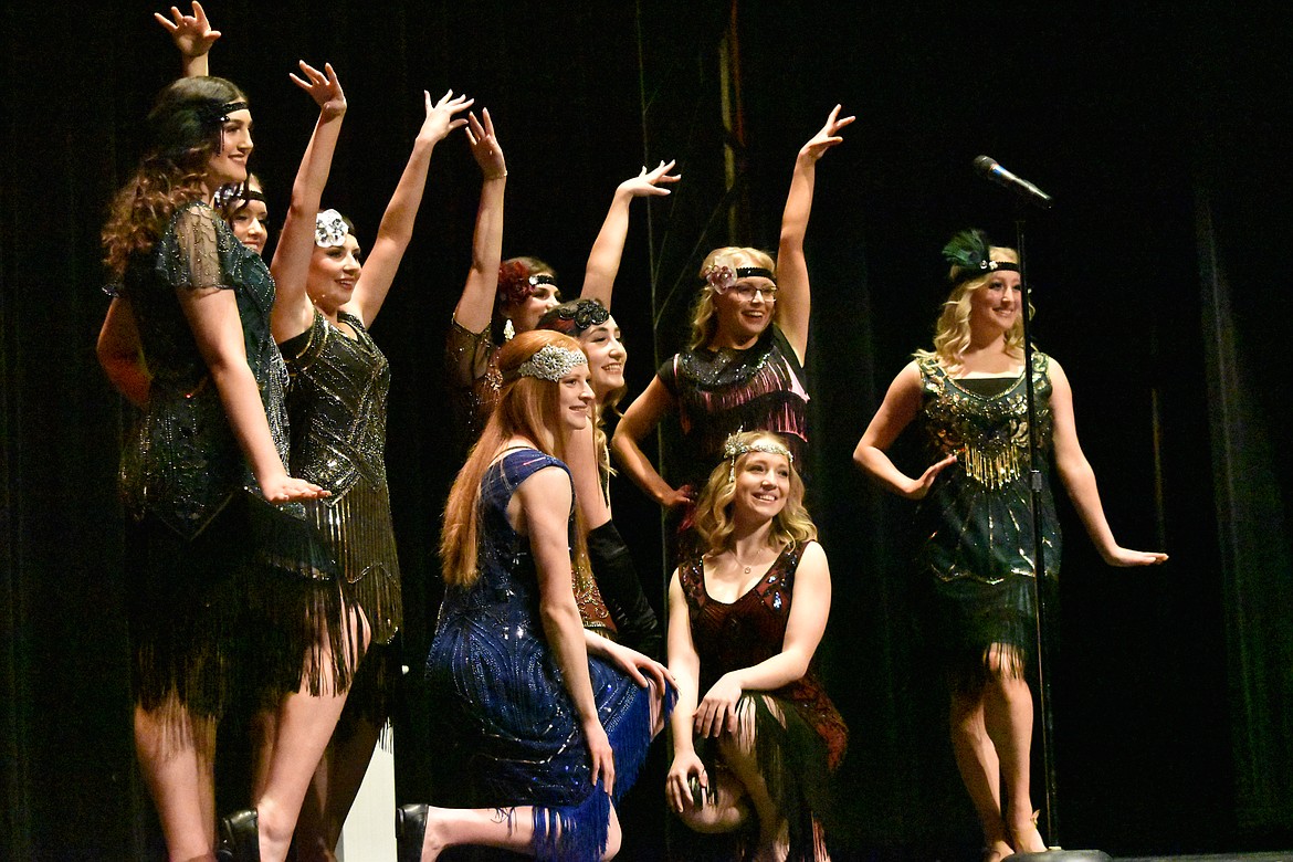 The six contestants for the 2023 Moses Lake distinguished young women program, along with the Moses Lake 2022 distinguished young women court pose during the ‘Roaring in the 20s’ themed program on March 12.