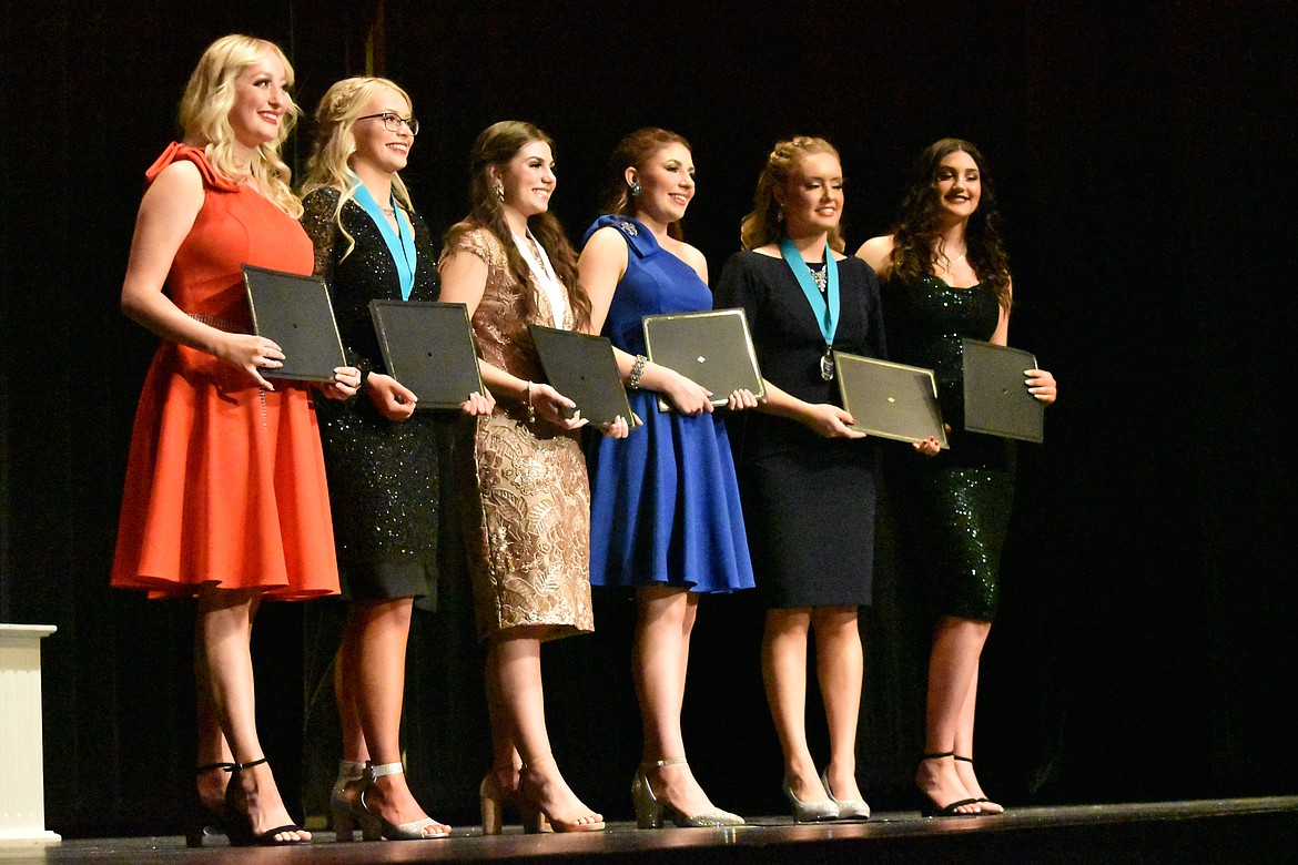 All six contestants of this year’s distinguished young women program smile with their certificates at the end of the program on March 12. Pictured from left to right are Reagan Radach, Lydia Jensen, Emma Fulkerson, Makiya Kast, McKenna Meise and Beverly Ross.
