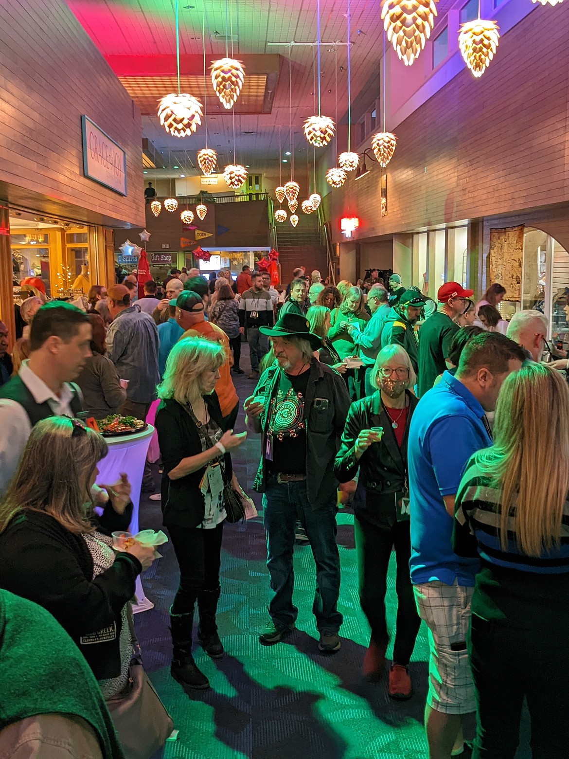 Bartender's Ball attendees pack into the decorated hallways of the The Resort Plaza Shops in downtown Coeur d’Alene Saturday night. The sold out event had more than 350 people show up to support Help Every Little Paw.