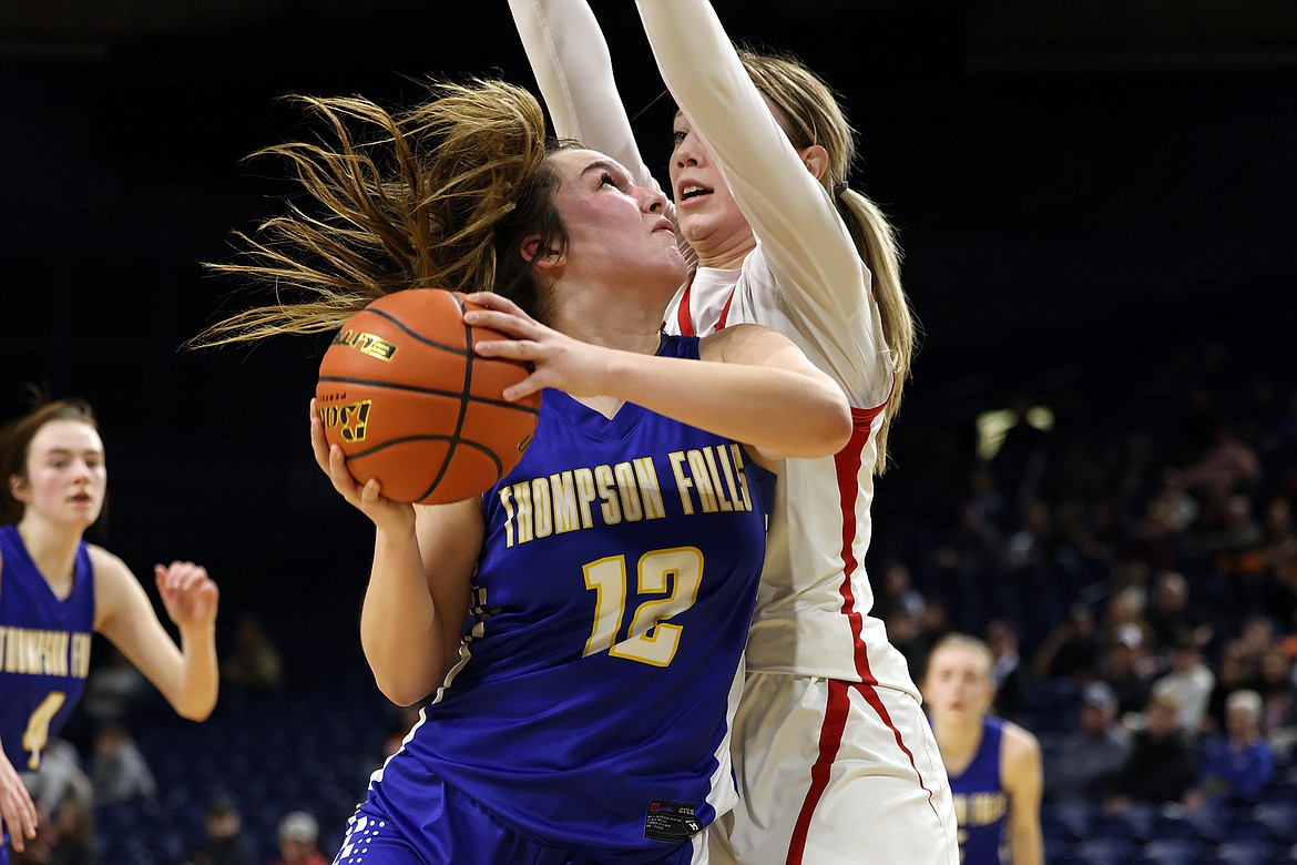 Thompson Falls forward Maliyah LeCoure makes a move to the basket against Glasgow in the opening round of the State B Basketball Tournament in Bozeman Thursday. (Jeremy Weber/Bigfork Eagle)