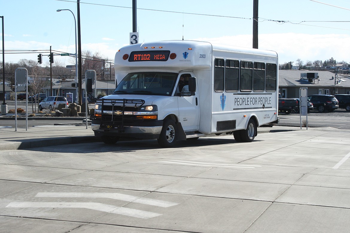 The People for People bus waits to load passengers en route to Othello and Tri-Cities Tuesday.