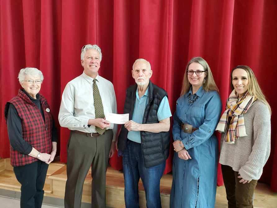 The Kalispell Elks Lodge No. 725 recently donated $3,500 to the Somers/Lakeside School District to help provide
items that are needed by the students such as clothing, shoes, sanitary items and other products. Some of these students and their families have been hit hard because virus-unemployment and other Covid-19
related issues. The items purchased will be included in the school’s closets in an effort to keep them stocked. There are two closets — one located in the Somers school office and one at Lakeside School — for food and snacks, clothes, sanitary items and other needed items.
Pictured left to right are Candy Stephens, Past Montana State Eagle Aerie president of the Elks; Joe Price, superintendent of the Somers School District; Bob Stephens, past Elks Grand Lodge committeeman; Rose McIntyre, Somers Middle School principal; and Steffanie Broyles, Lakeside Elementary School principal.