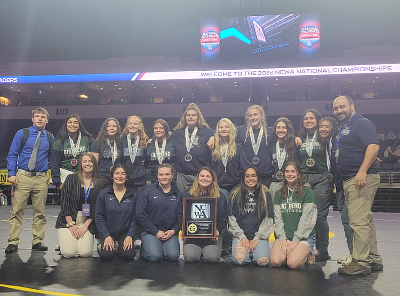 The Big Bend Women's wrestling team and Coach Bryan Seibel (right) brought home the NCWA National Title. The team competed recently in Allen, Texas.