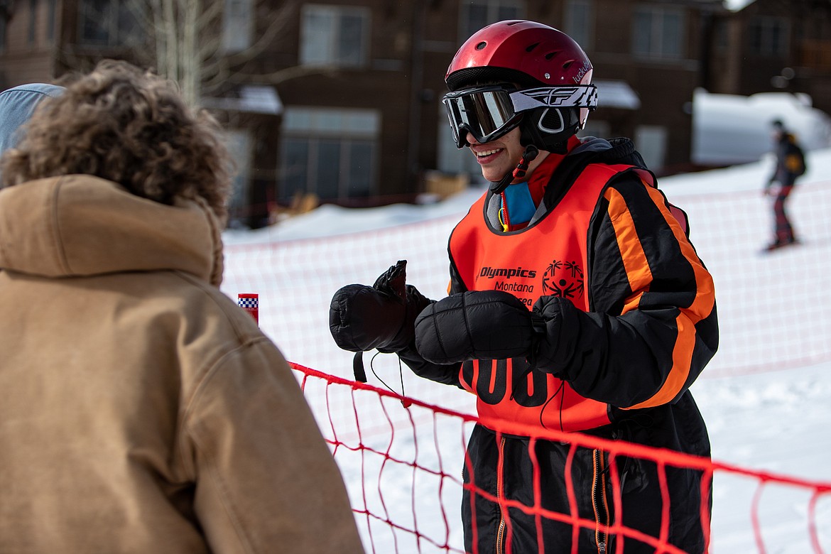 Racer Cole Carvey of Eureka is greeted by his family at the Special Olympics Montana Glacier Area Winter Games at Whitefish Mountain Resort on Tuesday. (JP Edge photo)