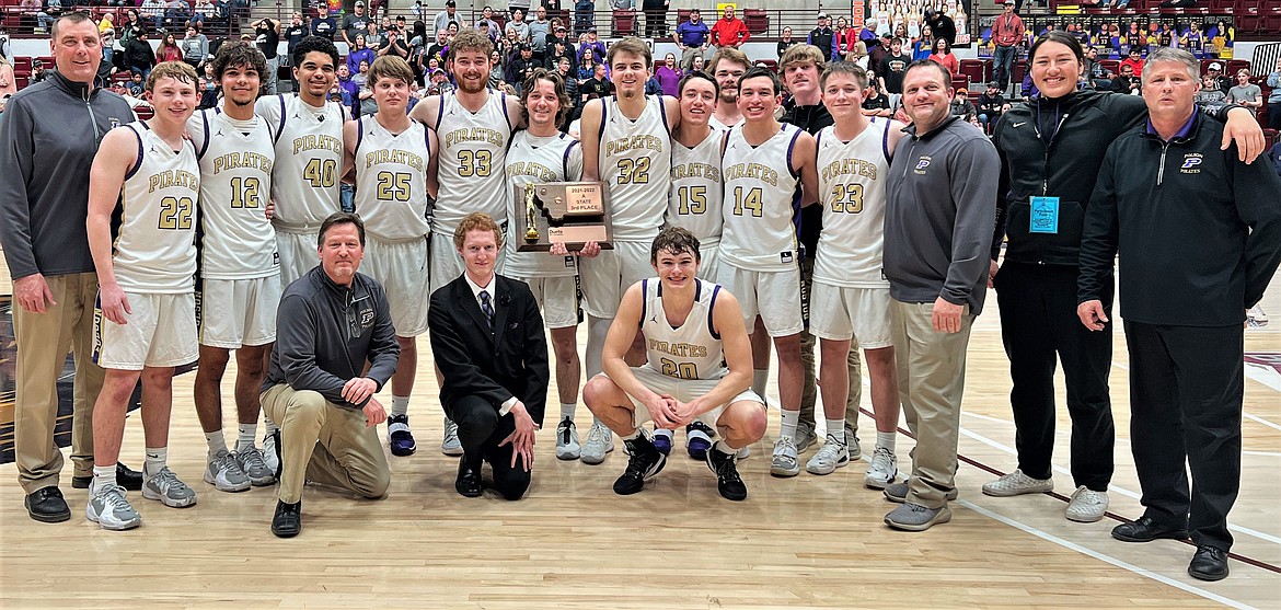 The 2021-22 Polson Pirates. Standing, from left: Coach Tim Lake, Trent Wilson, Robert Perez, Nikolai Figaro, Dawson Dumont, Braunson Henriksen, Xavier Fisher, Colton Graham, Tyler Wenderoth, Ethan McCauley, Alex Muzquiz, Brock Henriksen, Espn Fisher, Coach Brad Fisher, Cymian Kauley and Head Coach Randy Kelley. Kneeling, from left: Coach John Kelley, Manager David Bjorge and Jarrett Wilson. (Courtesy of Niki Graham)