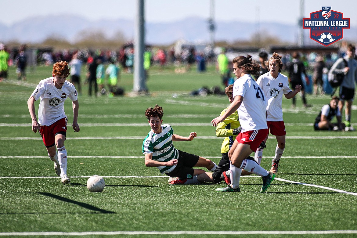 Photo by US Youth Soccer
Caden Thompson of the Timbers North FC 05 boys soccer team dribbles past defenders, with support from Stirling Roget, Chet Hanna and Miles Taylor (in yellow) at the USYS National League Showcase in Mesa, Ariz.