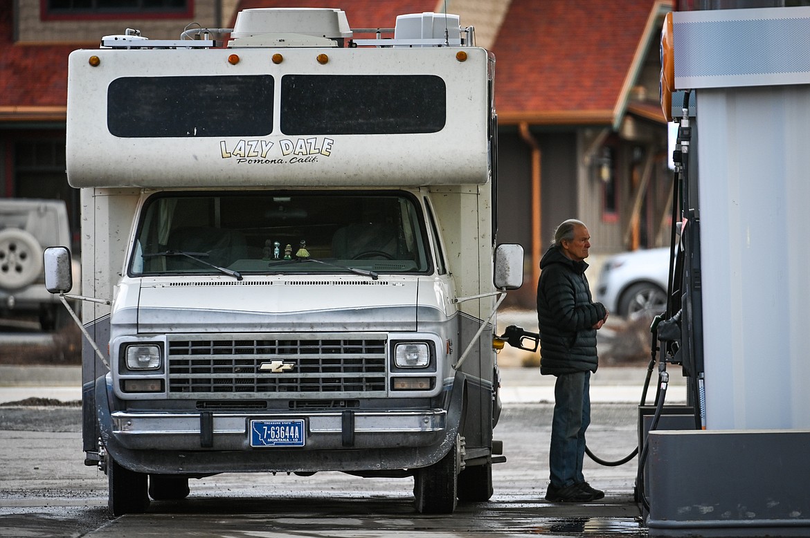 A motorist fuels up at a gas station in Kalispell on Wednesday, March 16. (Casey Kreider/Daily Inter Lake)