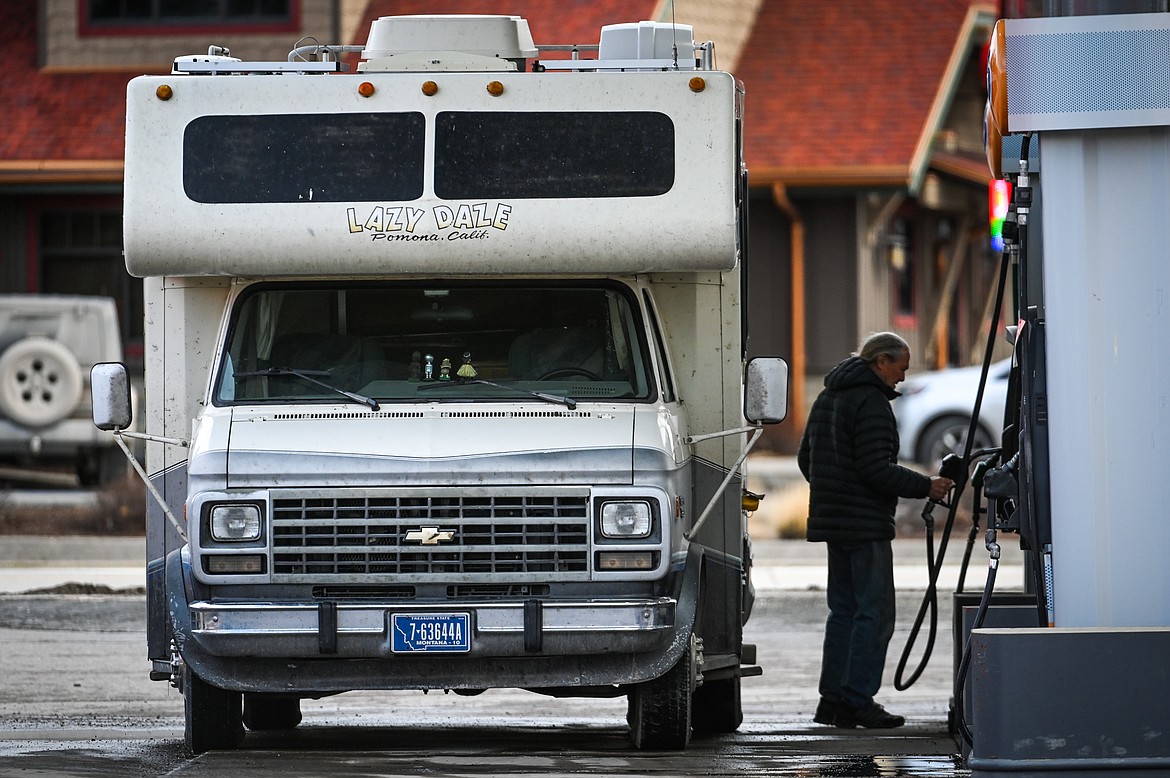 A motorist fuels up at a gas station in Kalispell on Wednesday, March 16. (Casey Kreider/Daily Inter Lake)