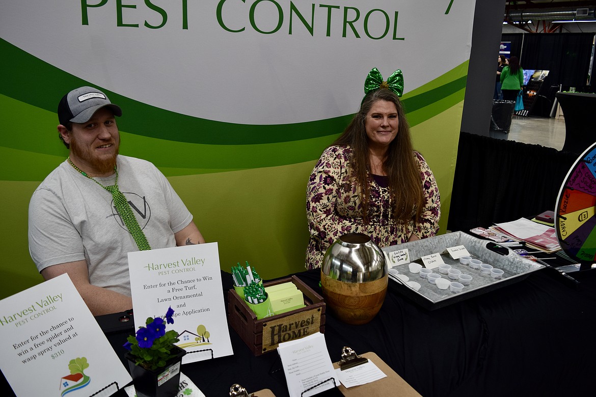 Richard Westra and Katrina Keithly of Harvest Valley Pest Control offered advice of their company’s services, prizes and samples of edible crickets at the St. Patrick’s Business Expo organized by the Moses Lake Chamber of Commerce at the Grant County Fairgrounds on Tuesday.