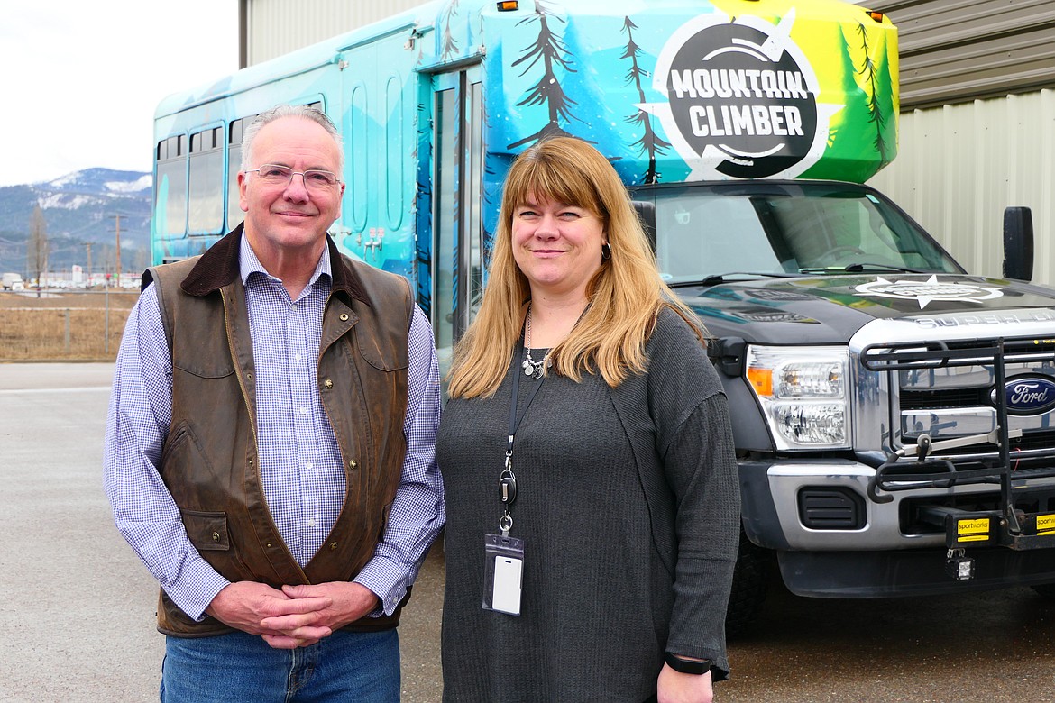 Dale Novak, left, is retiring as director of Flathead County Public Transit and Elizabeth Wood, who has been with the department for five years, is taking over as the new director. The department overseas the Mountain Climber bus service. (Heidi Desch/Daily Inter Lake)