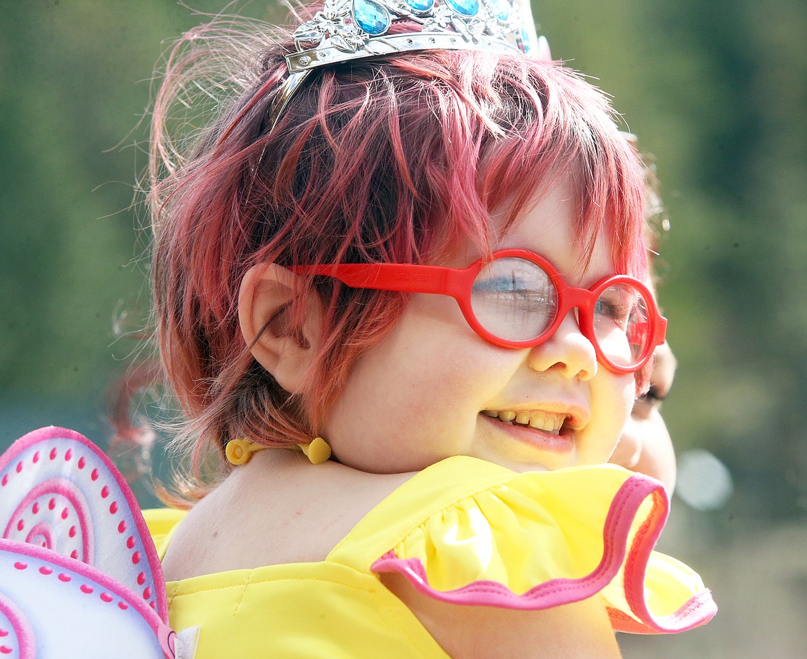 Harper Beare, 5, smiles on a Lake Coeur d'Alene Cruise boat Wednesday.