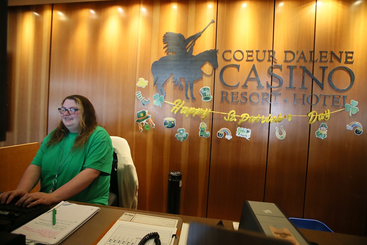 Hotel front desk agent Laura Daws is hard at work Thursday afternoon. The Coeur d'Alene Casino is celebrating its 29th anniversary this month.