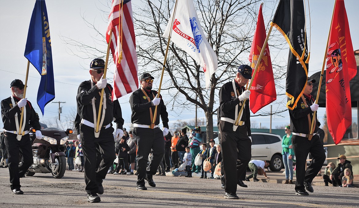 The Mission Valley Honor Guard signals the beginning of the St. Patrick's Day parade in Ronan. (Scot Heisel/Lake County Leader)