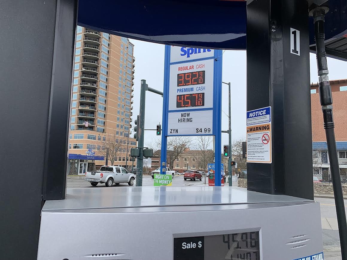 Traffic flows past the Spirit station in downtown Coeur d'Alene, where a gallon of regular unleaded was going for $3.92 on Monday.