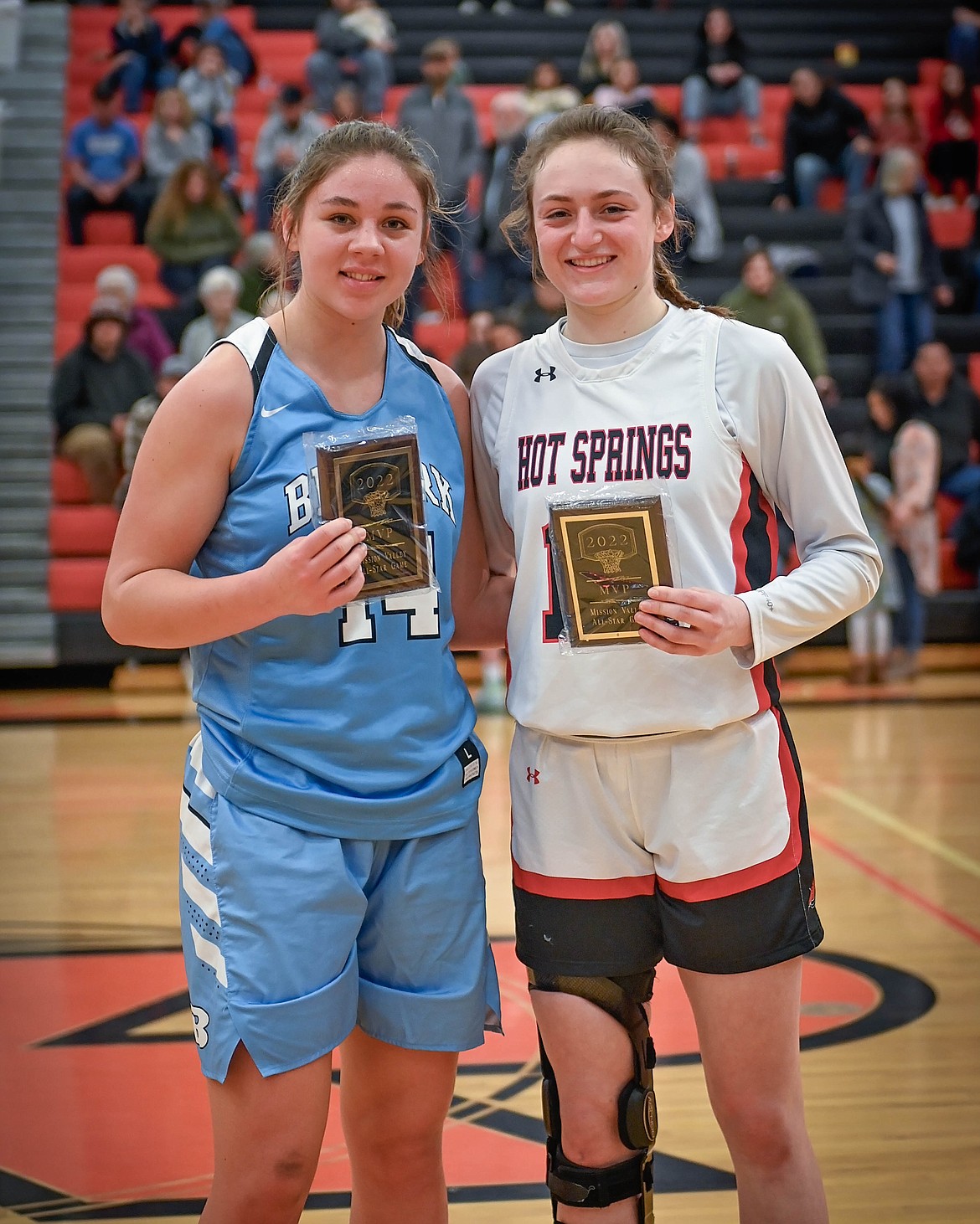 Madison Chappuis of Bigfork and Katelyn Christensen of Hot Springs pose with their co-MVP plaques. (Courtesy of Christa Umphrey, Forward Photography)