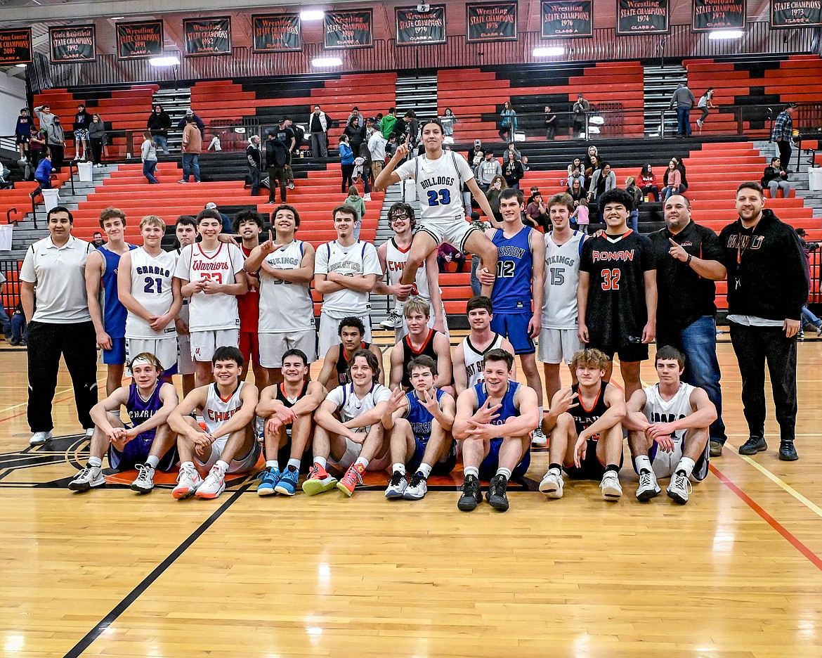 The 2022 Mission Valley boys all stars (left to right) back row, standing: coach DJ Fish, Nick Walker (Bigfork), Stetson Reum (Charlo), Nate Gates (Two Eagle River), Ben Old Person-Harlow (Arlee), Levi Fullerton (Arlee), George Brown (Bigfork), Colton Graham (Polson), Payton Cates (Ronan), Cederick McDonald (Mission), Ross McPherson (Mission), Bryce Gilliard (Bigfork), Marlo Tonasket (Ronan), coach Robert McCrea, coach George Sherwood. Middle row, kneeling: Nate Lawhead (Hot Springs), Jack McAllister (Hot Springs), Kyle Lawson (Hot Springs). Front row, seated: Keaton Piedalue (Charlo), Elijah Tonasket (Ronan), Ruben Couture (Ronan), Xavier Fisher (Polson), Zoran LaFrombois (Mission), Levi Taylor (Bigfork), Jayden Weeks (Plains), Coyle Nagy (Charlo). Unable to attend: Isak Epperly (Bigfork), Jarrett Wilson (Polson). (Courtesy of Christa Umphrey, Forward Photography)