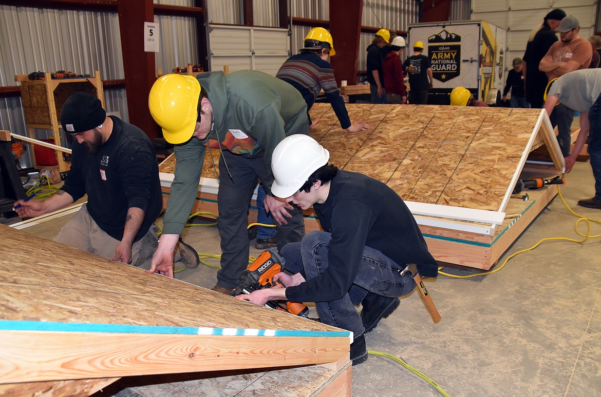 Measure twice and cut once was the message at the Construction Combine attended by 40 local high school students on Tuesday. Stations for hands-on learning experiences included plumbing, dry wall, electrical, framing including roofs, walls and trusses and roofing. Students will assembled the constructed components into sheds that were donated to local veterans.