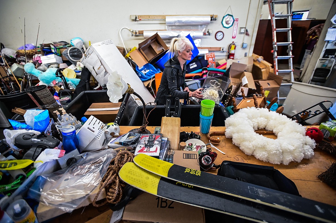 Suzanna Rasmussen works on pricing hard goods at Flathead Industries in Kalispell on Wednesday, Sept. 29. (Casey Kreider/Daily Inter Lake)