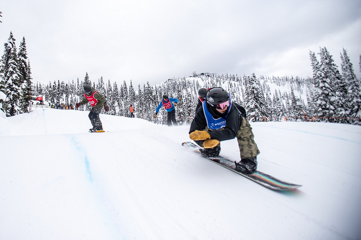 A racer tucks and passes two competitors. (JP Edge photo)