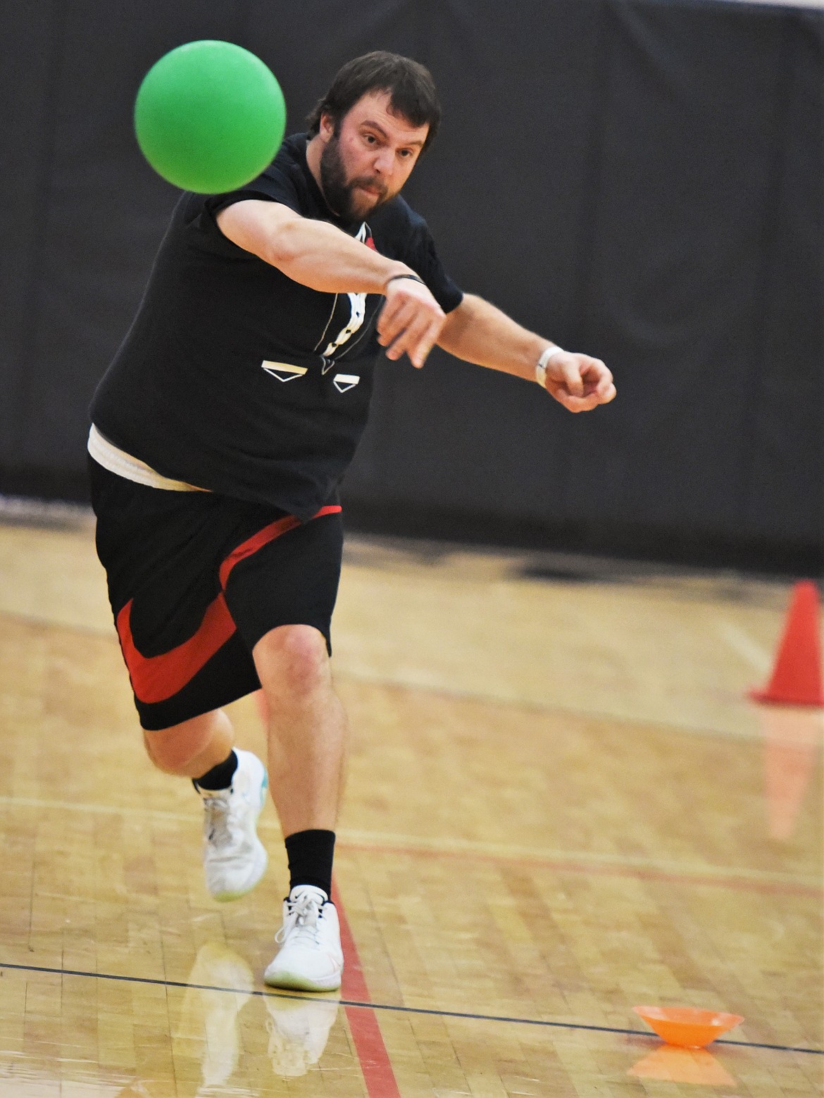 Activities Director and Ronan Middle School teacher Mitchell Wassam fires a heater at an opponent. (Scot Heisel/Lake County Leader)