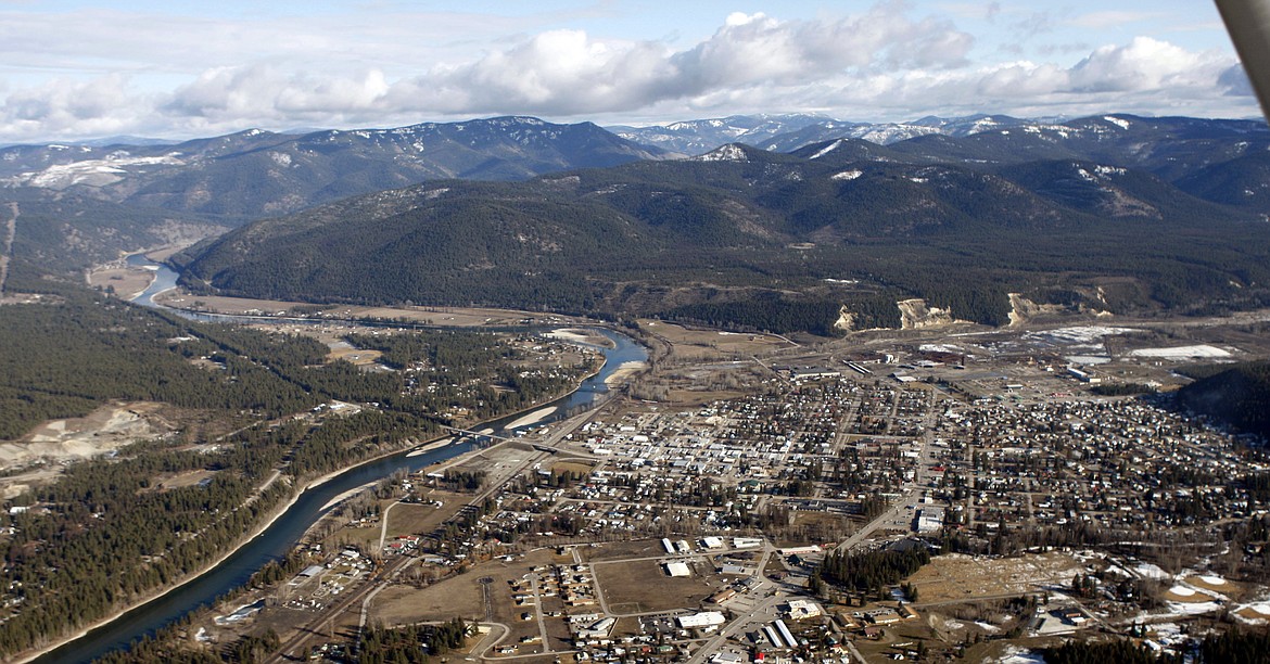 FILE - This Feb. 17, 2010, aerial file photo, shows the town of Libby Mont. With a decades-long cleanup of asbestos contamination in the town largely completed, state officials are taking over the effort to protect residents from future exposure to the potentially deadly material. (AP Photo/Rick Bowmer, File)