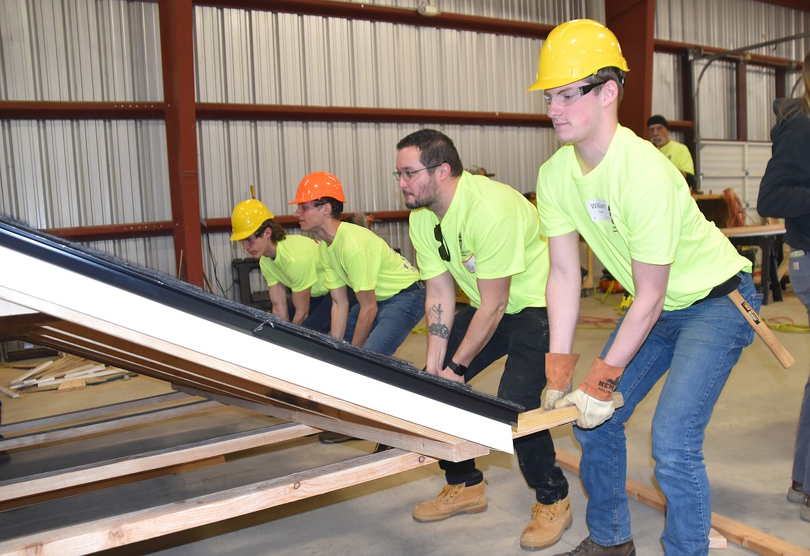Students from Sandpoint, Lake Pend Oreille and Clark Fork high schools took part in a two-day Construction Combine to learn the different facets of the building industry. The four completed sheds were donated to local veterans.