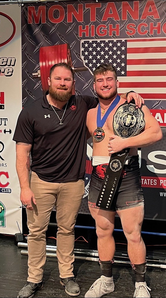 Jake Rendina, right, poses with his championship belt after the Montana State Powerlifting Championships, held at Helena Capital High School on Saturday, March 19. At left is his coach and lifting partner, Donny Tudahl. (Photo courtesy Donny Tudahl)