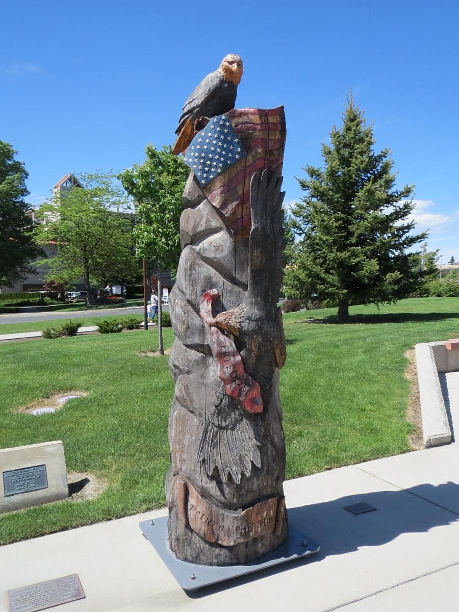 Duane Rasmussen photo
Artist Jeff May carved the Freedom Tree trunk into a beautiful totem, topped by an eagle, which now sits at the western edge of the improved McEuen Park.