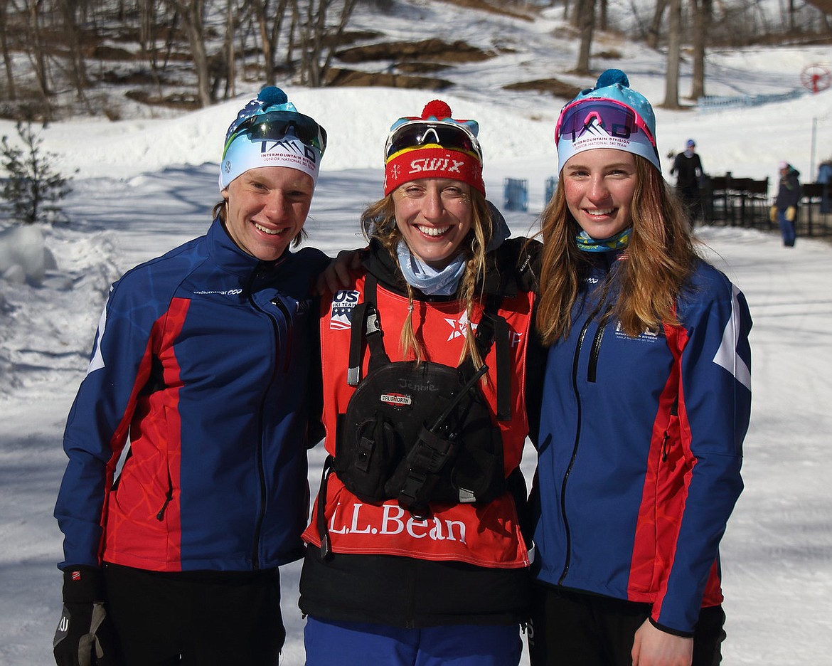 Glacier Nordic Club competitors Jacob Henson, left, and Maeve Ingelfinger, right, with their coach Jenny Bender, center, at Junior Nationals held in Minnesota in mid-March. (Wayne Petsch photo)