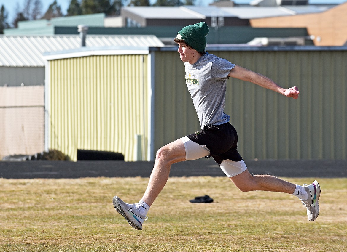 Whitefish High School track and field athlete Morgan Kyle practices bounding on a nice spring day last week. (Whitney England/Whitefish Pilot)