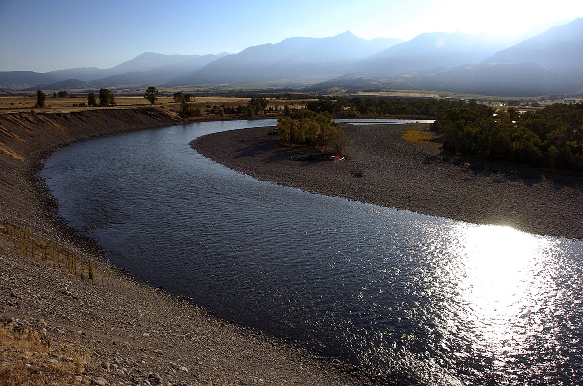 This Aug. 21, 2016, file photo shows the Yellowstone River near Pray, Mont. A conservation group has filed a lawsuit against U.S. environmental officials for alleged failure to intervene after the Montana Legislature rolled back longstanding water pollution rules. (AP Photo/Matthew Brown, File)