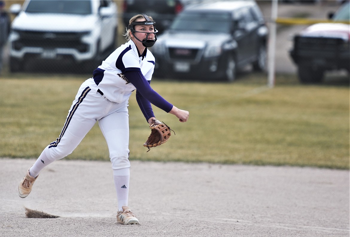 Sophomore third baseman Carli Maley fires a throw to first base. (Scot Heisel/Lake County Leader)