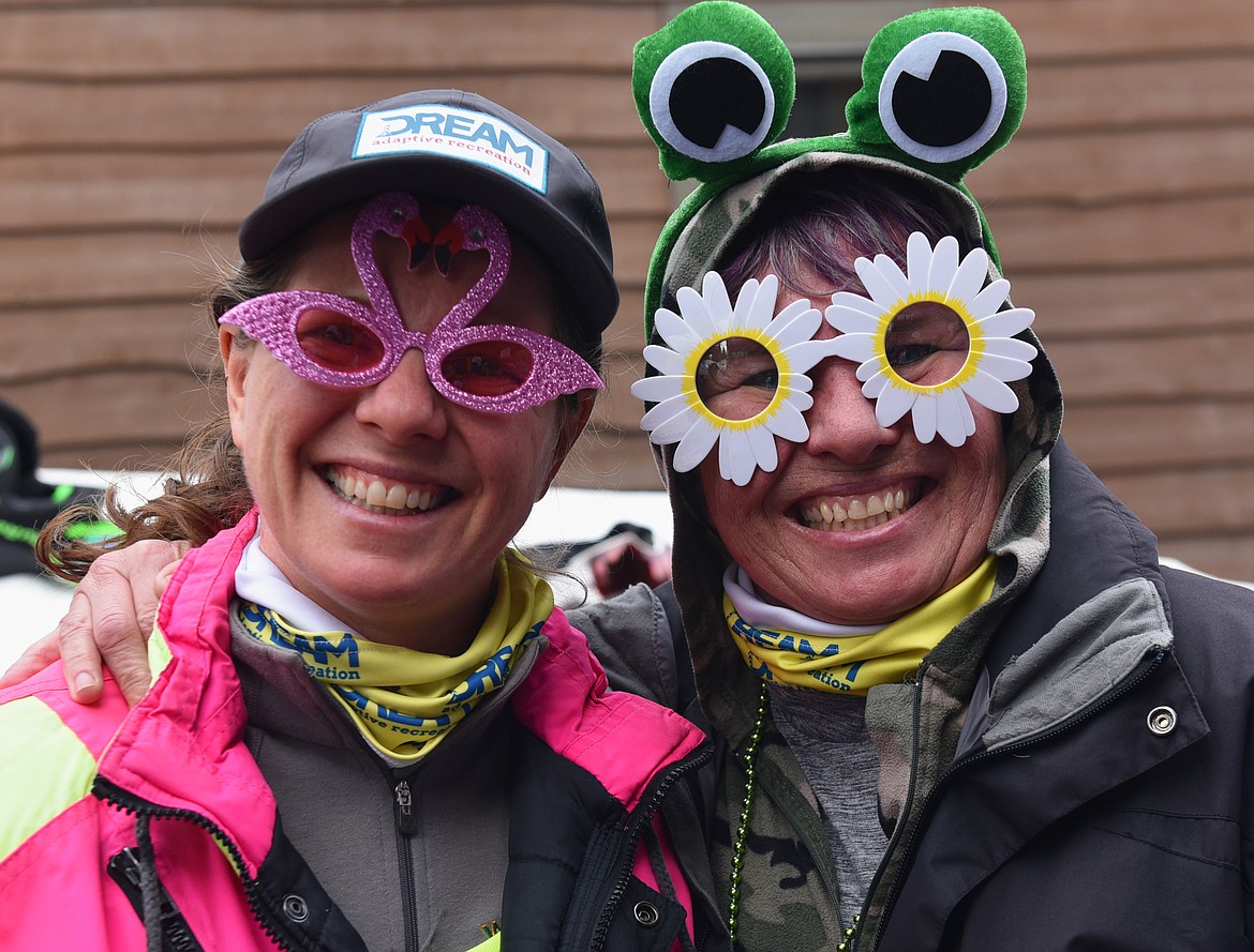 Sisters Cheryl Luke and Andrea Davis participate in DREAM Adaptive's Shred-a-thon Saturday. (Julie Engler/Whitefish Pilot)