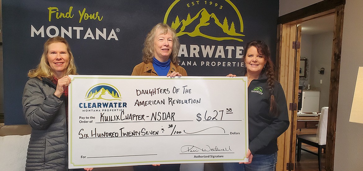 The 2022 donation to Daughters of the American Revolution, left to right, Roni Mitch and Nancy Mehaffie with DAR, Mary Halling, Clearwater Agent and DAR member.