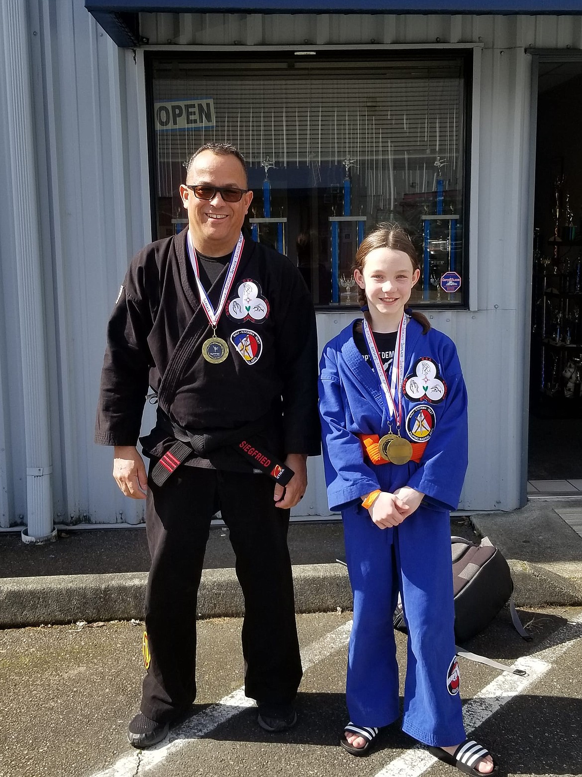 Martial arts instructor Mike "Ziggy" Siegfried and his young protege' 12-year-old Alannah Winland. Following Winland's first karate tournament, she walked away with a silver and a bronze medal, despite competing against older, male competitors with higher ranking than she has.
