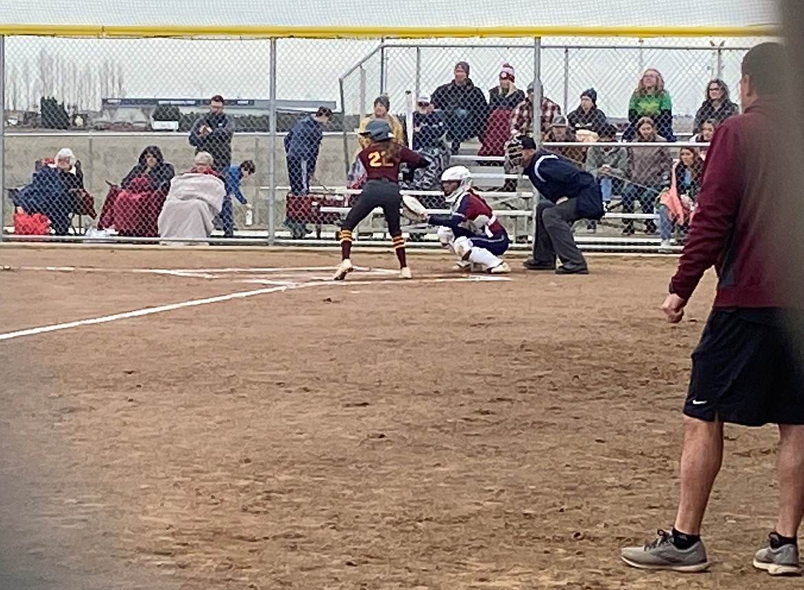 MLHS junior Annalyse Hernandez (22) stands in the batter’s box as she waits for the pitch to be thrown.