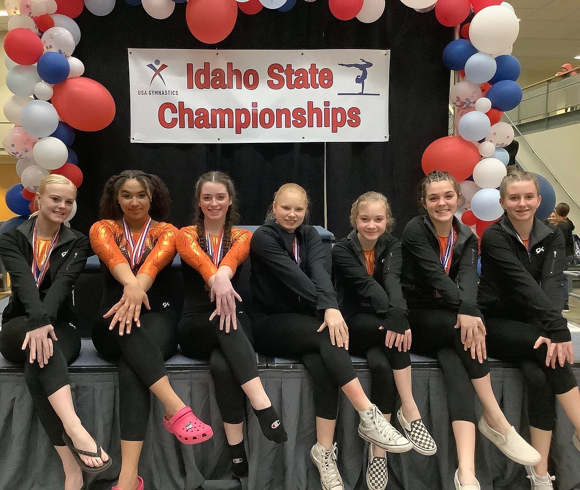 Courtesy photo
The North Idaho Gymnastics Gold team at the recent Xcel state gymnastics championships in Moscow. From left from Session 2 are Fancy Bowlsby, Shariece Vandever, Jonni Sanborn, Izzy McCaslin, Lexi Schreibeis, Keana Pettyjohn and Makenna Hillman.