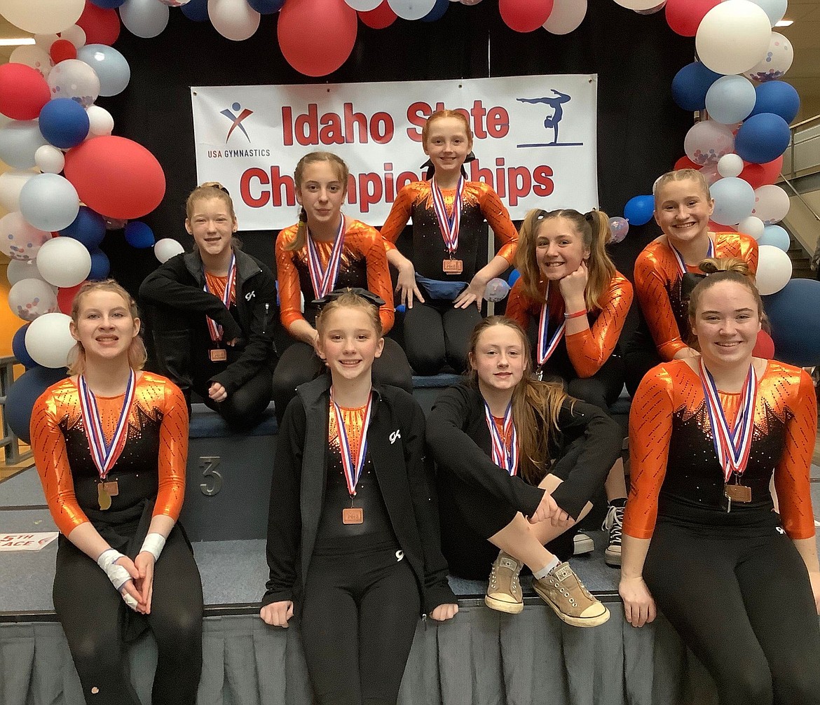 Courtesy photo
The North Idaho Gymnastics Silver team at the recent Xcel state gymnastics championships in Moscow. In the front row from left are Veronica Ault, Fynlie Reynolds, Sue Millard and Elizabeth Phillips; and back row from left, Shelby Adkison, Delaniey Wenstrom, Elleah Hubbard, Laina Busicchia and Charlee Friddle.