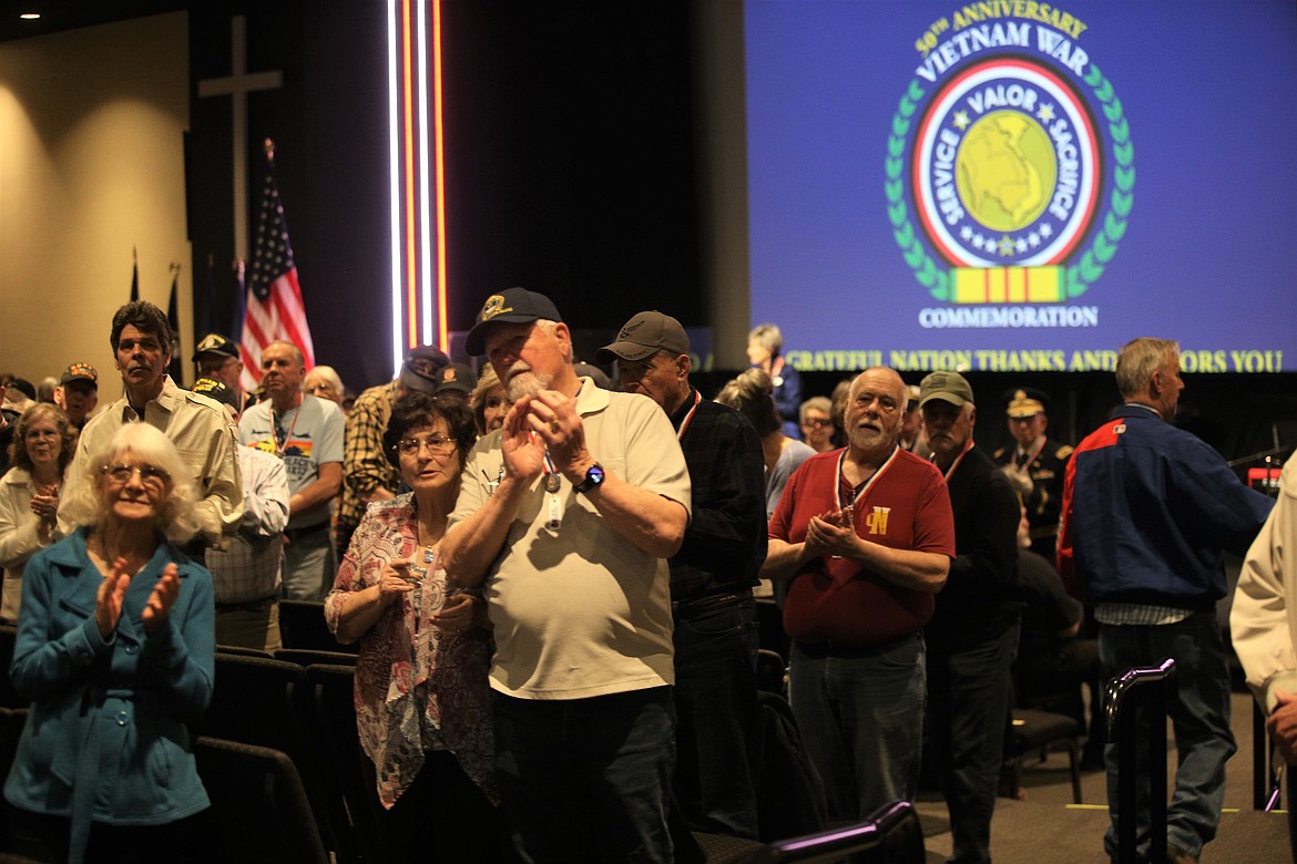 The crowd welcomes Vietnam War veterans on Tuesday at Candlelight Christian Fellowship.