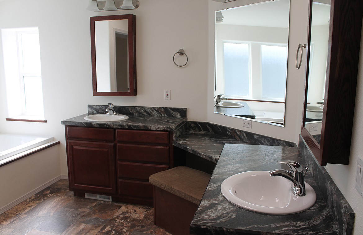 The master bathroom in a 2,800-square-foot Valley Quality Homes house.