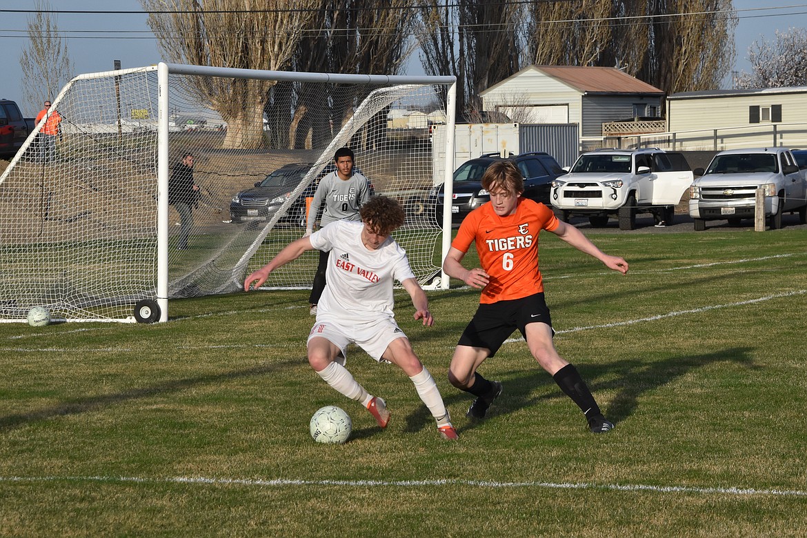 Ephrata High School junior Hudson Sager (6) goes after the ball while an East Valley opponent attempts to keep him from it on March 29.