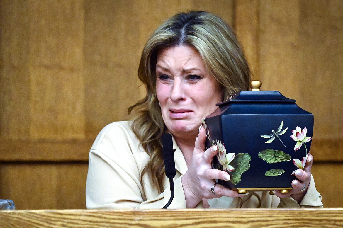 Jessie Hanson holds an urn containing the ashes of her daughter Brooke while she addresses Jessica Adena Farbstein at Farbstein's sentencing hearing in Flathead County District Court on Thursday, March 31. (Casey Kreider/Daily Inter Lake)