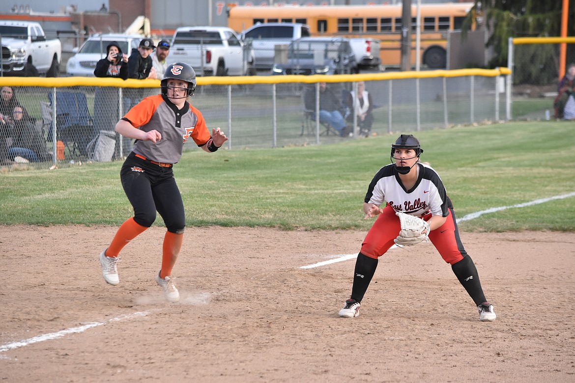 Ephrata High School senior Alexis Bicondova leads from third base while an East Valley opponent stands at the ready during the doubleheader against East Valley on March 29 at Ephrata.