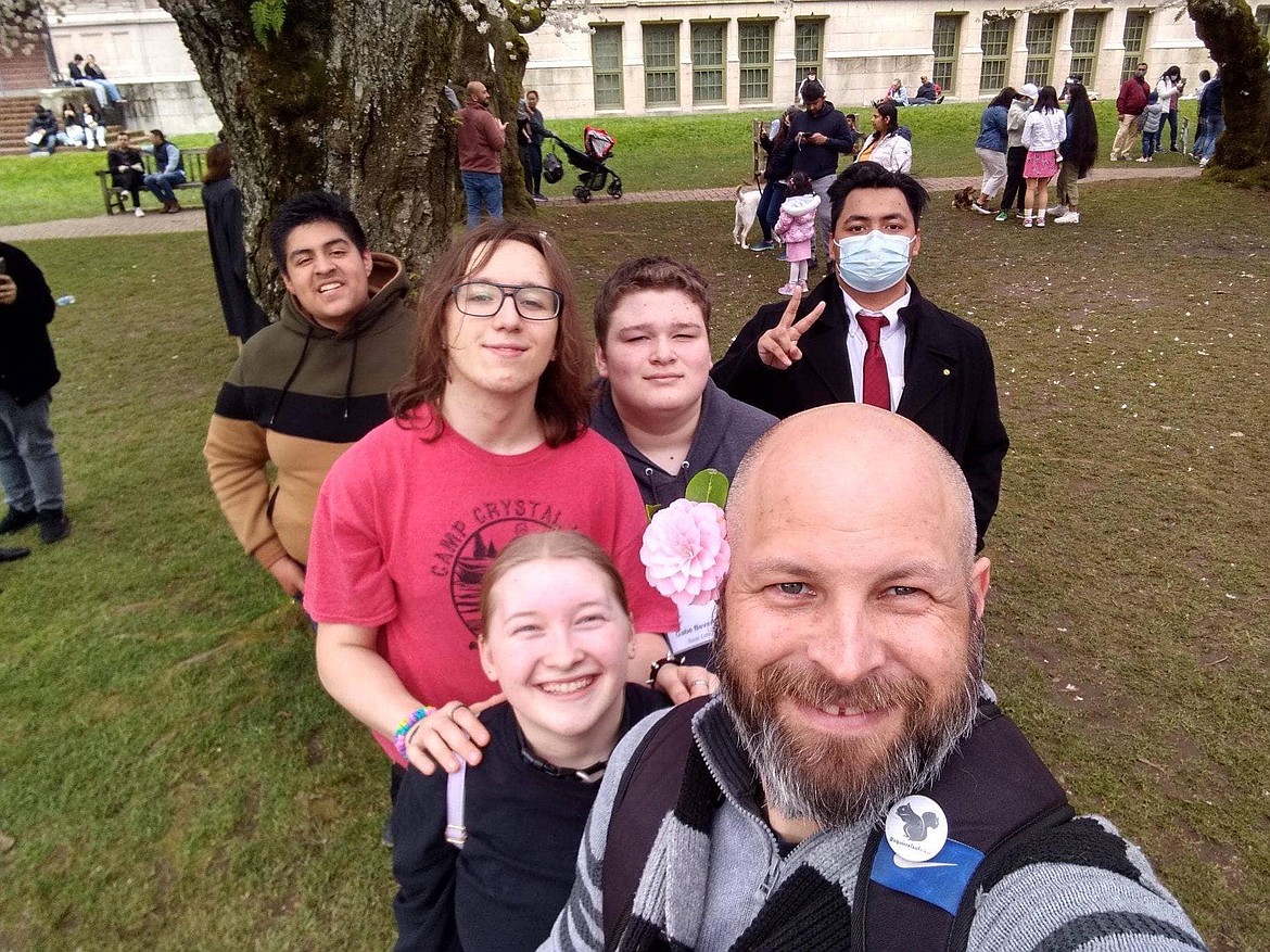 Soap Lake Orca Bowl advisor and science teacher Matthew Brewer poses with members of the Soap Lake High School Orca Bowl Team.