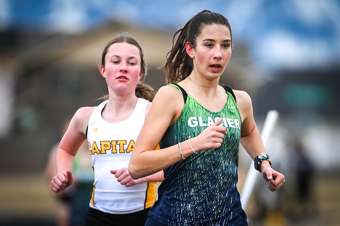 Glacier's Holly Skelton leads the pack in the girls 1600 meter run in a dual against Helena Capital at Glacier High School on Friday, April 1. (Casey Kreider/Daily Inter Lake)