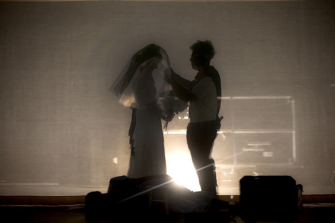 Laurey (Emily Kalmbach, left) has a disconcerting surprise during her dream about her wedding day - who is it that will be lifting the veil?